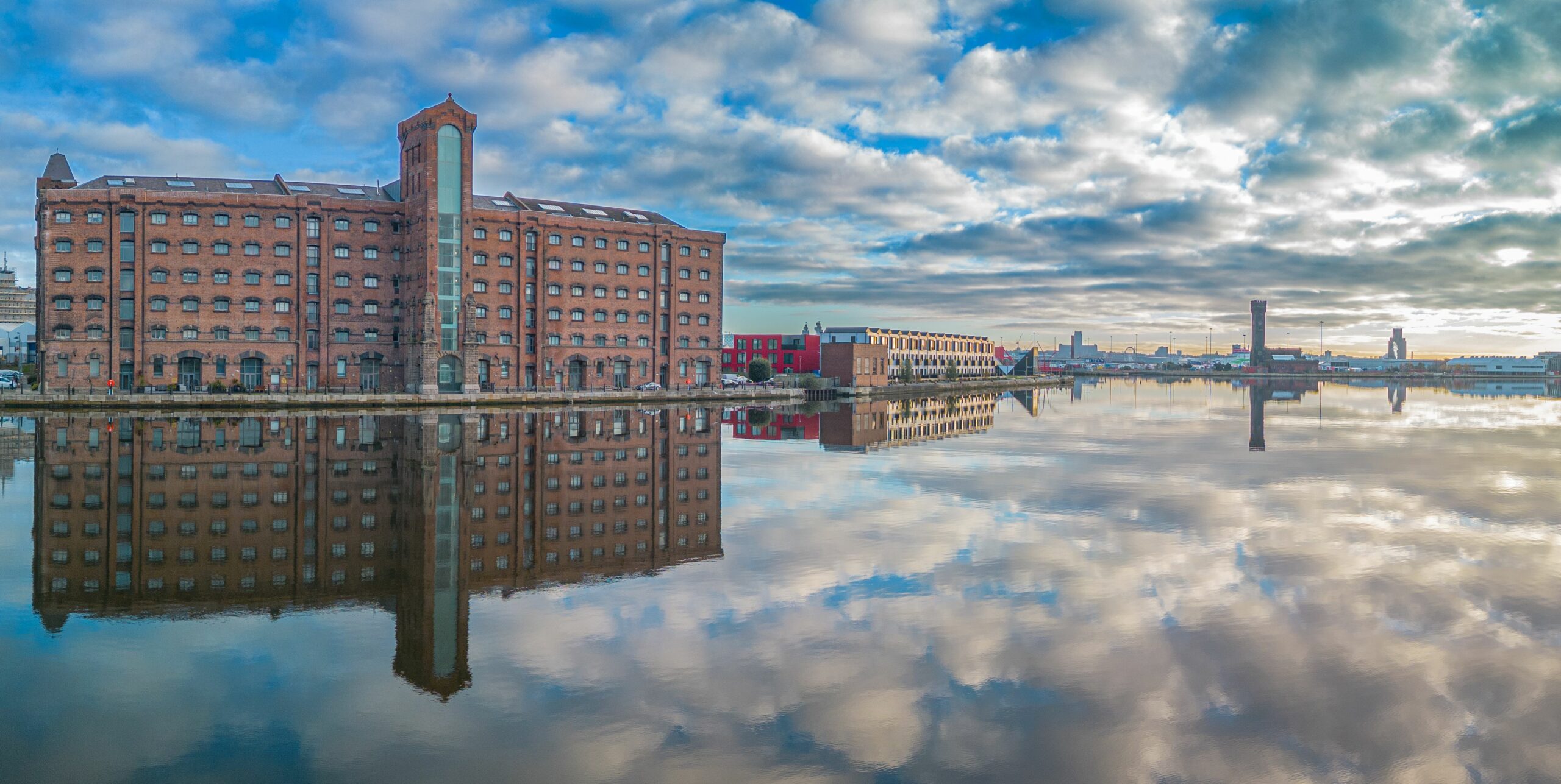 building with water in front of it. shot on the quay