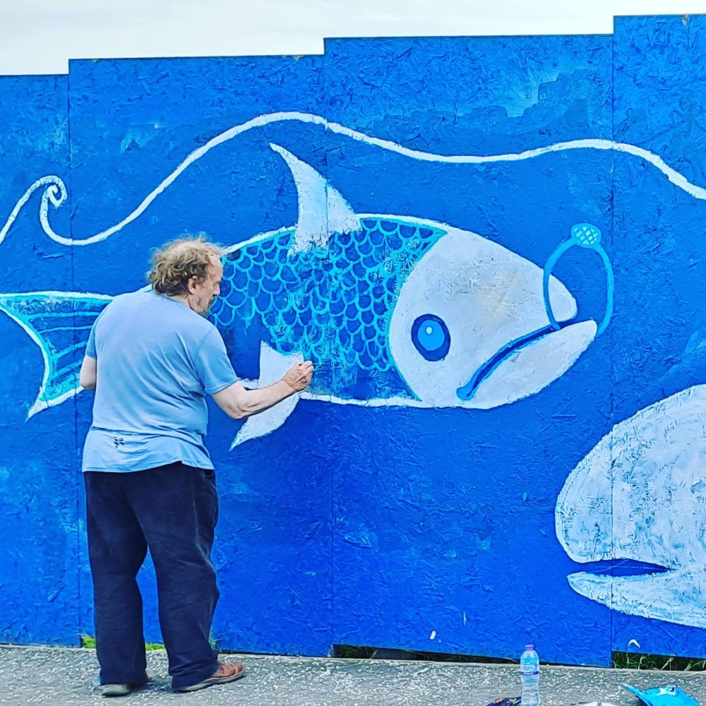 Mural of fish on wall