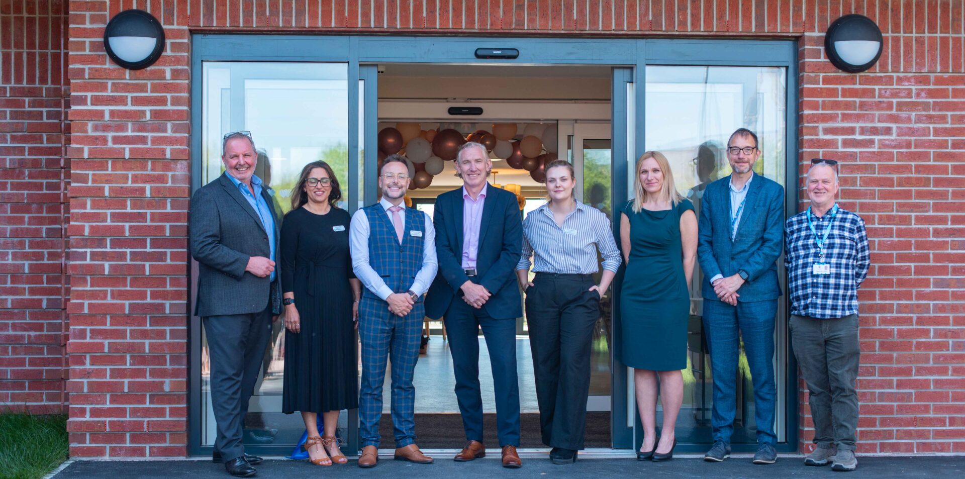 Image of representatives from Peel Waters, Montpeilier, Tanglewood and Trafford Council marking the official opening of Trafford Care Home
